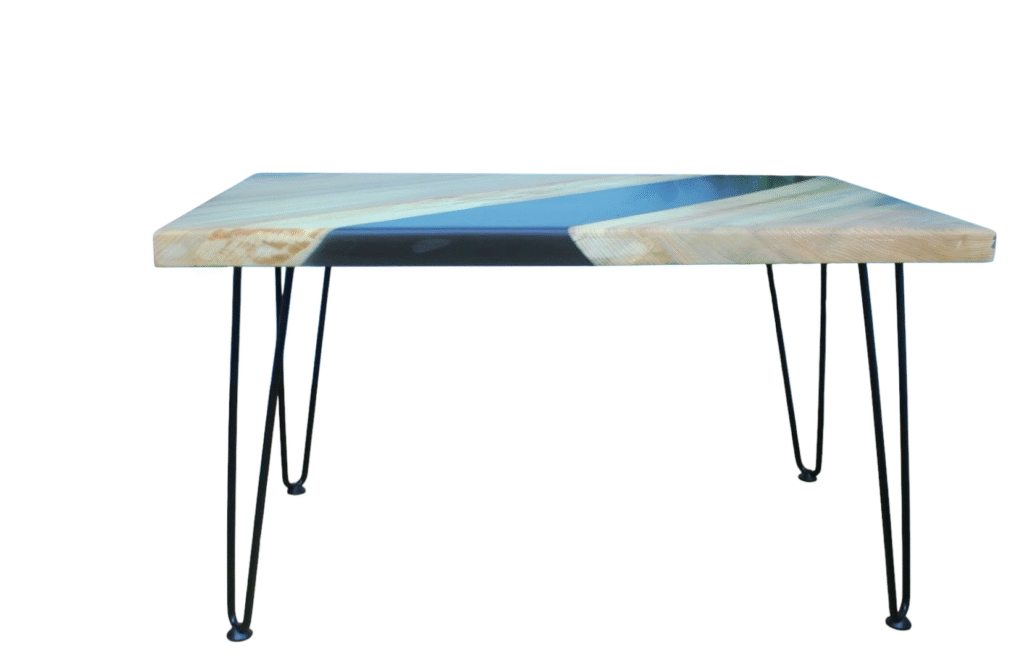 Maple wood rectangular top sitting on 4 pin legs