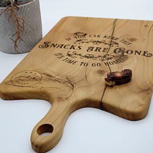 A cutting board with engraved inscriptions
