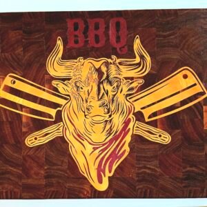 Extra-large end grain walnut meat carving board featuring a massive bull head, crossed meat cleavers, and 'BBQ' lettering inlaid with maple and purple heart wood.
