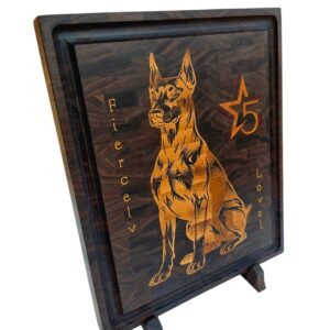 Handmade walnut end grain cutting board with detailed maple and padauk Doberman dog inlay on a display stand.