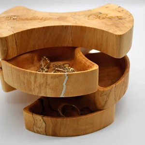 Handcrafted sculptural ash wood jewelry organizer with four drawers – artisan eco‑friendly storage